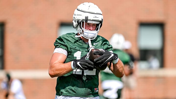 Michigan State's Jack Velling runs after a catch during the first day of football camp on Tuesday, July 30, 2024, in East Lansing. Michigan State's Jack Velling runs after a catch during the first day of football camp on Tuesday, July 30, 2024, in East Lansing.