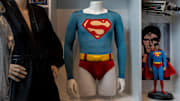 Costumes worn in Christopher Reeve’s Superman films are displayed inside the home office of Jay Towers, anchor for Fox 2 and host of “Jay Towers in the Morning,” in Oakland County on Wednesday, Aug. 20, 2025. Towers has amassed a collection of memorabilia spanning decades of Superman history.