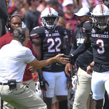 South Carolina Head Coach Shane Beamer congratulates South Carolina defensive back O'Donnell Fortune (3) after a defensive play during the first quarter at Williams-Brice Stadium in Columbia, S.C. Saturday, September 14, 2024.