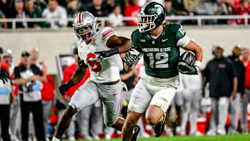 Michigan State's Jack Velling, right, runs after a catch as Ohio State's Sonny Styles closes in during the second quarter on Saturday, Sept. 28, 2024, at Spartan Stadium in East Lansing.