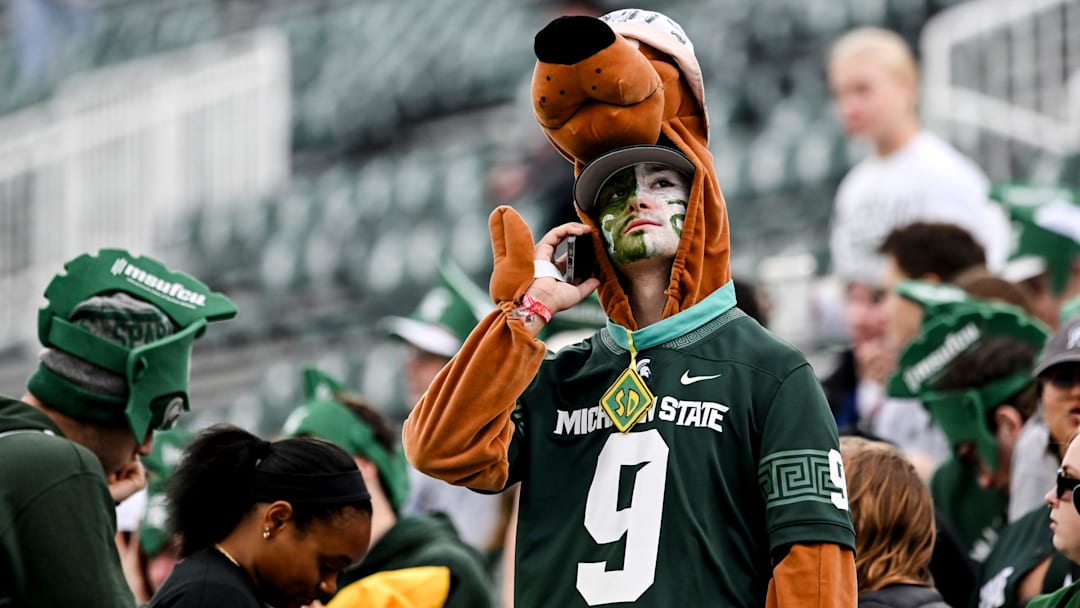 A Michigan State fan in a Scooby-Doo costume looks on before the game against Penn State on Saturday, Nov. 15, 2025, at Spartan Stadium in East Lansing.