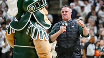 Michigan State's new football coach Pat Fitzgerald addresses the crowd during a timeout in the first half of the Spartans basketball game against Iowa on Tuesday, Dec. 2, 2025, at the Breslin Center in East Lansing.