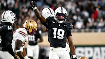 Michigan State's Armorion Smith celebrates after tackling Boston College's Lewis Bond during the first quarter on Saturday, Sept. 6, 2025, at Spartan Stadium in East Lansing.