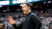 Duke's head coach Jon Scheyer calls out to players during the first half in the game against Michigan State on Saturday, Dec. 6, 2025, at the Breslin Center in East Lansing.