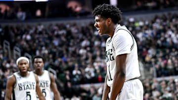 Michigan State's Jase Richardson gets excited after his teammate Szymon Zapala dunks and draws a foul during the first half in the game against Florida Atlantic on Saturday, Dec. 21, 2024, in East Lansing.