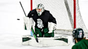 Michigan State's Trey Augustine blocks the puck during hockey practice on Thursday, Sept. 25, 2025, at Munn Arena in East Lansing.