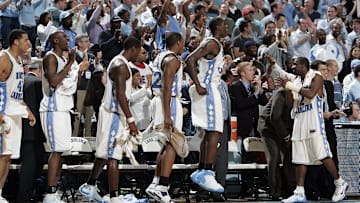 Jan 8, 2005; Chapel Hill, NC, USA; UNC Tar Heel players celebrate on the bench in UNC's 109-75 win over the Maryland Terapins.
Mandatory Credit: Photo By Bob Donnan-Imagn Images