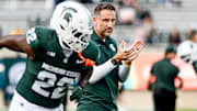 Michigan State's defensive coordinator Joe Rossi watches during warmups before the football game against Western Michigan on Friday, Aug. 29, 2025, in East Lansing.