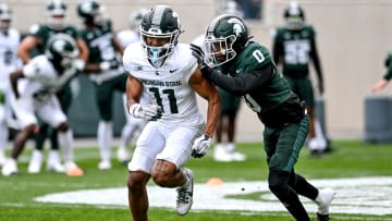 Michigan State's Aziah Johnson, left, and Charles Brantley participate in a drill during the Spring Showcase on Saturday, April 20, 2024, at Spartan Stadium in East Lansing.