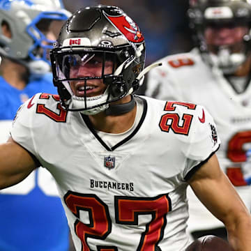 Sep 15, 2024; Detroit, Michigan, USA;  Tampa Bay Buccaneers cornerback Zyon McCollum (27) celebrates after interception Detroit Lions quarterback Jared Goff (16) on the Lions first offensive play of the game in the  first quarter at Ford Field. Mandatory Credit: Lon Horwedel-Imagn Images