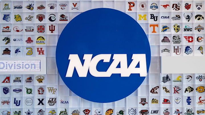 University logos cover a wall in the lobby of NCAA headquarters Thursday, Feb. 25, 2021, in Indianapolis University logos cover a wall in the lobby of NCAA headquarters Thursday, Feb. 25, 2021, in Indianapolis