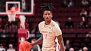 Tallahassee, Florida - Florida State Seminoles guard/forward Jamir Watkins (1) handles the ball against the Louisville Cardinals (December 21, 2024)