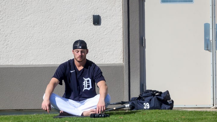 Detroit Tigers pitcher Mason Englert meditates before the start of workouts during spring training. 