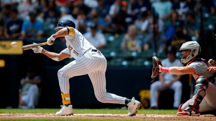 Milwaukee Brewers Left Fielder Jackson Chourio (11) bunts a ball during a game between the Milwaukee Brewers and Cincinnati Reds at American Family Field in Milwaukee, Wisconsin on Sunday, Aug. 11, 2024. - Max Correa / Milwaukee Journal Sentinel