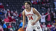 Feb 5, 2025; Athens, Georgia, USA; Georgia Bulldogs forward Asa Newell (14) controls the ball against the LSU Tigers during the second half at Stegeman Coliseum.