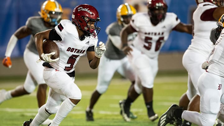 Dothan's Tamarion Peterson (5) runs the ball at Cramton Bowl in Montgomery, Ala., on Thursday, Oct. 27, 2022. Dothan leads Jeff Davis 31-6 at halftime.