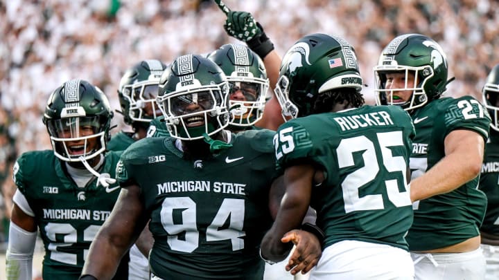 Michigan State's D'Quan Douse, left, celebrates his safety with teammates during the first quarter in the game against Florida Atlantic on Friday, Aug. 30, 2024, at Spartan Stadium in East Lansing.