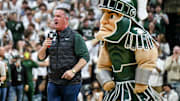 Michigan State's new football coach Pat Fitzgerald addresses the crowd during a timeout in the first half of the Spartans basketball game against Iowa on Tuesday, Dec. 2, 2025, at the Breslin Center in East Lansing.
