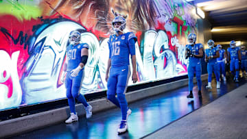 Detroit Lions quarterback Jared Goff (16) and guard Graham Glasgow (60) walk down the tunnel before the game against Atlanta Falcons at Ford Field in Detroit on Sunday, Sept. 24, 2023.