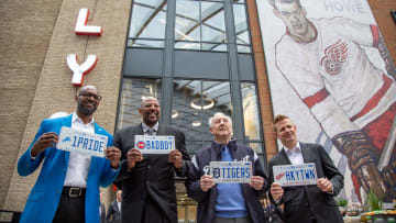 Former Detroit Lion, Herman Moore, left, stands with former Piston Earl Cureton, Tigers great Al Kaline, and Former Red Wing Chris Osgood.