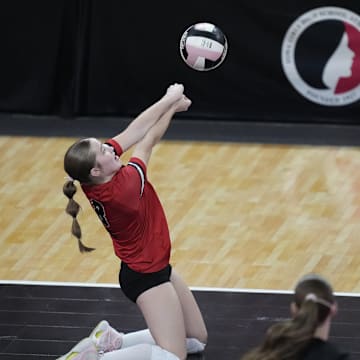 Davenport Assumption to the semifinals of the Class 3A Iowa girls high school state volleyball tournament on Tuesday.