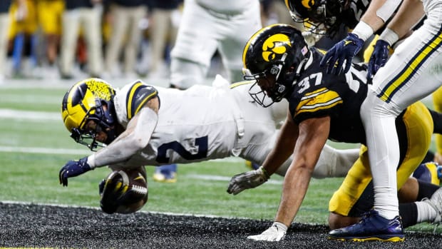 Michigan running back Blake Corum runs for a touchdown during the second half of U-M's 26-0 win over Iowa