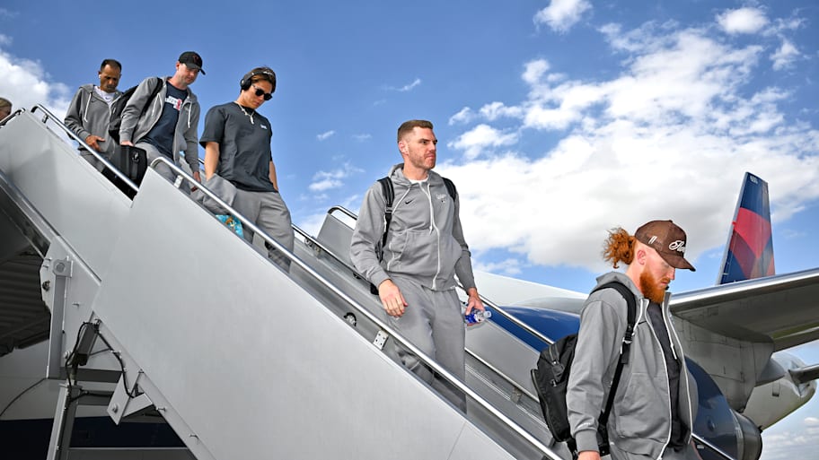 Los Angeles Dodgers deplane from players-only plane on June 23, 2025