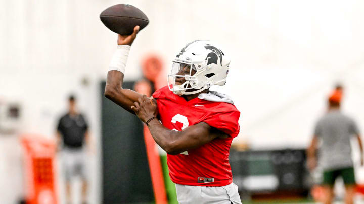 Michigan State's Aidan Chiles throws a pass during camp on Monday, Aug. 5, 2024, at the indoor practice facility in East Lansing.