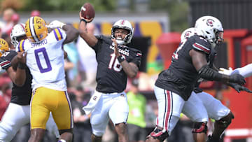 South Carolina quarterback LaNorris Sellers (16) passes near Louisiana State University defensive end Paris Shand (0) during the first quarter at Williams-Brice Stadium in Columbia, S.C. Saturday, September 14, 2024.