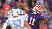 Nov 23, 2024; Clemson, South Carolina, USA; Clemson Tigers defensive lineman Peter Woods (11) reacts after sacking The Citadel Bulldogs quarterback Johnathan Bennett (11) during the first half at Memorial Stadium. Mandatory Credit: Ken Ruinard-Imagn Images