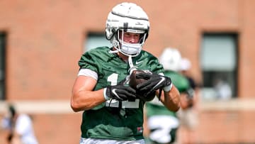 Michigan State's Jack Velling runs after a catch during the first day of football camp on Tuesday, July 30, 2024, in East Lansing.