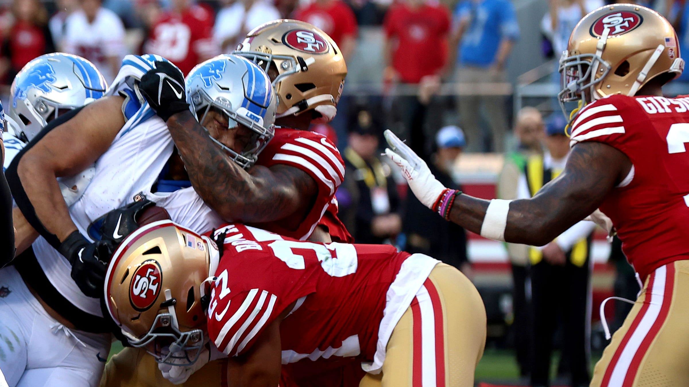 Lions running back David Montgomery gets wrapped up by the defense during the fourth quarter of the NFC Championship game.