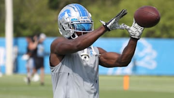 Lions receiver Quintez Cephus catches balls after the team's first padded practice of preseason camp Aug. 1, 2022 in Allen Park.

Lions
