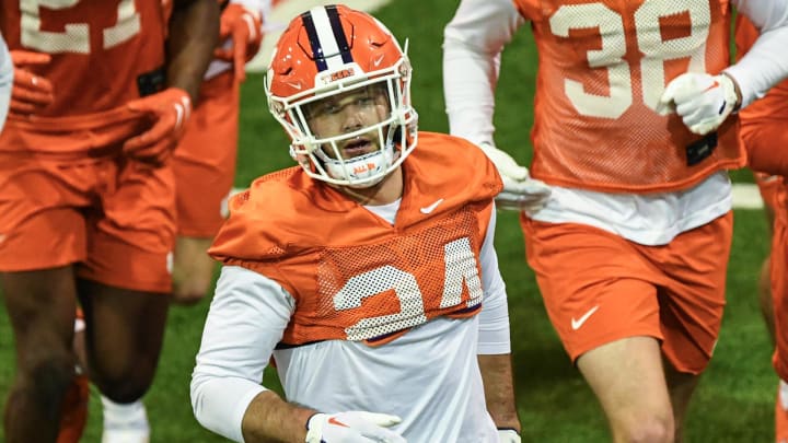 Clemson safety Tyler Venables (24) runs to another drill station during Spring practice