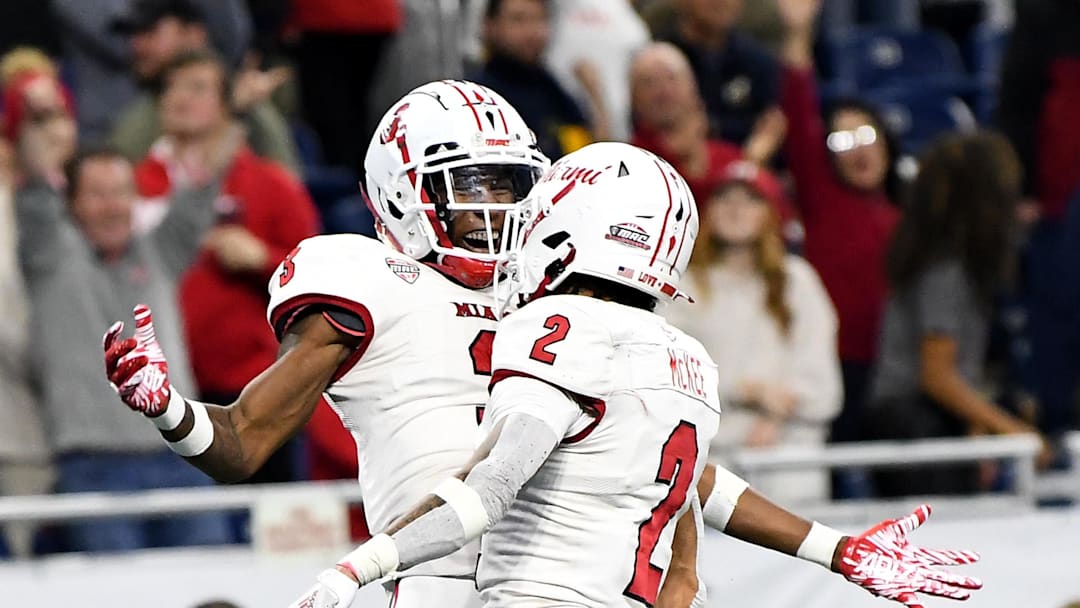Dec 2, 2023; Detroit, MI, USA; Miami (OH) Redhawks defensive back Yahsyn McKee (2) celebrates with defensive back William Hardrick (3) after making an interception against the Toledo Rockets in the fourth quarter at Ford Field. Mandatory Credit: Lon Horwedel-Imagn Images Dec 2, 2023; Detroit, MI, USA; Miami (OH) Redhawks defensive back Yahsyn McKee (2) celebrates with defensive back William Hardrick (3) after making an interception against the Toledo Rockets in the fourth quarter at Ford Field. Mandatory Credit: Lon Horwedel-Imagn Images