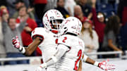 Dec 2, 2023; Detroit, MI, USA;  Miami (OH) Redhawks defensive back Yahsyn McKee (2) celebrates with defensive back William Hardrick (3) after making an interception against the Toledo Rockets in the fourth quarter at Ford Field. Mandatory Credit: Lon Horwedel-Imagn Images