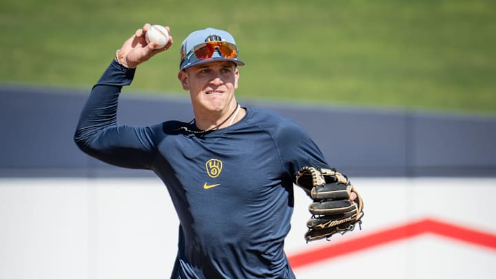 Milwaukee Brewers infielder Cooper Pratt throws to the ball during spring training workouts Tuesday, February 17, 2026, at American Family Fields of Phoenix in Phoenix, Arizona.