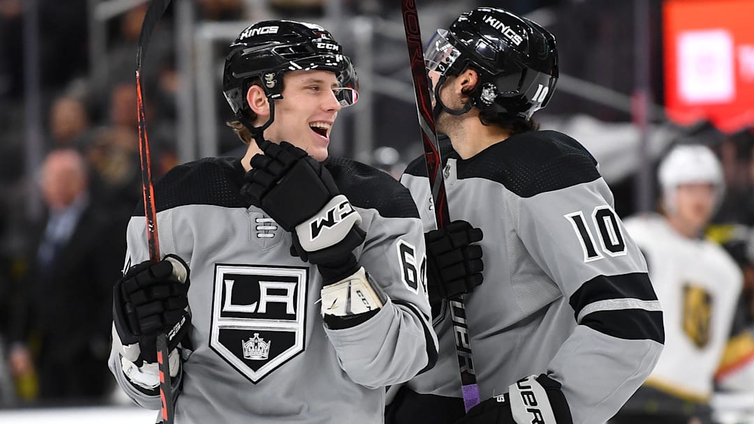 Dec 23, 2018; Las Vegas, NV, USA; Los Angeles Kings right wing Matt Luff (64) congratulates center Michael Amadio (10) after he scored a second period goal against the Vegas Golden Knights at T-Mobile Arena. Mandatory Credit: Stephen R. Sylvanie-Imagn Images