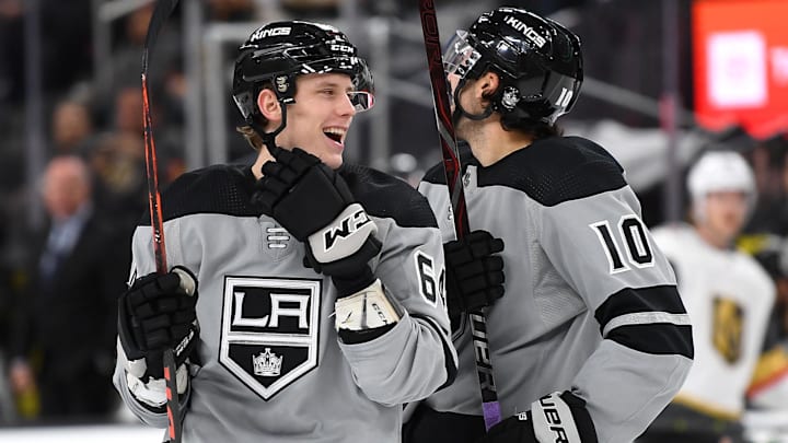 Dec 23, 2018; Las Vegas, NV, USA; Los Angeles Kings right wing Matt Luff (64) congratulates center Michael Amadio (10) after he scored a second period goal against the Vegas Golden Knights at T-Mobile Arena. Mandatory Credit: Stephen R. Sylvanie-Imagn Images