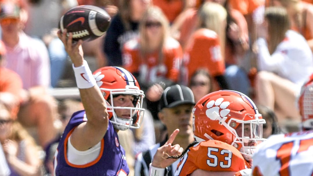 Clemson quarterback Cade Klubnik (2) passes near the blocking from Clemson offensive lineman Ryan Linthicum (53) during the Spring football game in Clemson, S.C. Saturday, April 6, 2024.