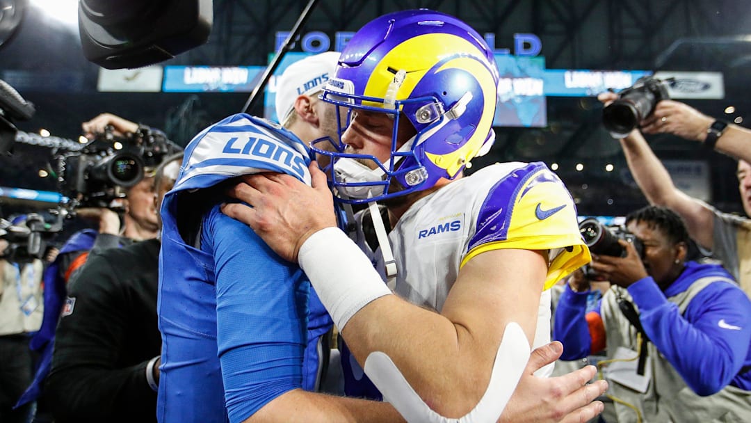 Detroit Lions quarterback Jared Goff hugs Los Angeles Rams quarterback Matthew Stafford after the Lions' 24-23 win in the NFC wild-card game at Ford Field in Detroit on Sunday, Jan, 14, 2024.
