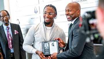 Michigan State Athletics Hall of Fame inductee Darqueze Dennard, left, poses with athletic director Alan Haller during the induction ceremony on Friday, Sept. 13, 2024, at the Clara Bell Smith Center in East Lansing.