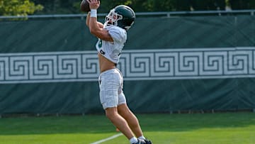 Michigan State's Caleb Gash (15) grabs a pass during practice Tuesday, Aug. 5, 2025.
