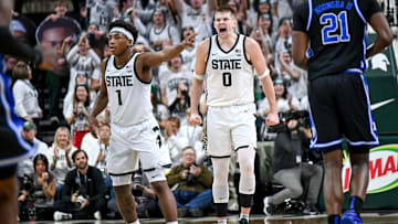 Michigan State's Jaxon Kohler, center, celebrates his 3-pointer against Duke during the first half on Saturday, Dec. 6, 2025, at the Breslin Center in East Lansing.