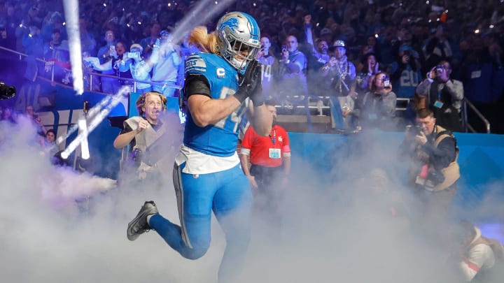 Detroit Lions linebacker Alex Anzalone (34) runs out of the tunnel for player introduction before kickoff against Tampa Bay Buccaneers at the first half of the NFC divisional round at Ford Field in Detroit on Sunday, Jan. 21, 2024.