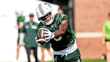 Michigan State's Nick Marsh catches a pass during the first day of football camp on Tuesday, July 30, 2024, in East Lansing.