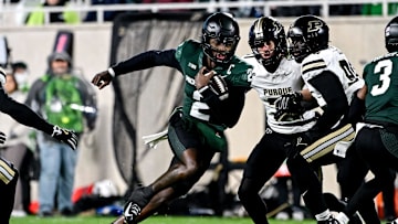 Michigan State's Aidan Chiles runs for a gain against Purdue during the first quarter on Friday, Nov. 22, 2024, at Spartan Stadium in East Lansing.
