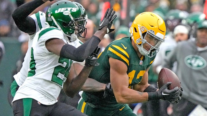 Green Bay Packers wide receiver Allen Lazard (13) catches a 35 yard pass defended by New York Jets safety Lamarcus Joyner (29) during the first half of their game on Sunday, Oct. 16, 2022 at Lambeau Field in Green Bay.

Packers Jets 0653