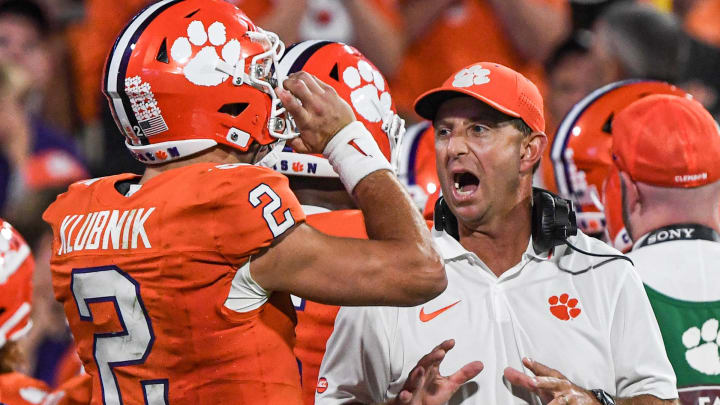 Sep 16, 2023; Clemson, South Carolina; Clemson quarterback Cade Klubnik (2) listens to Head Coach Dabo Swinney during the third quarter with Florida Atlantic at Memorial Stadium.