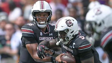 South Carolina quarterback LaNorris Sellers (16) hands off the ball to Rocket Sanders (5) during the first quarter at Williams-Brice Stadium in Columbia, S.C. Saturday, September 14, 2024.